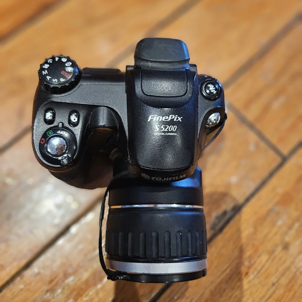 Fujifilm S2000 Digital Camera - Black and Silver